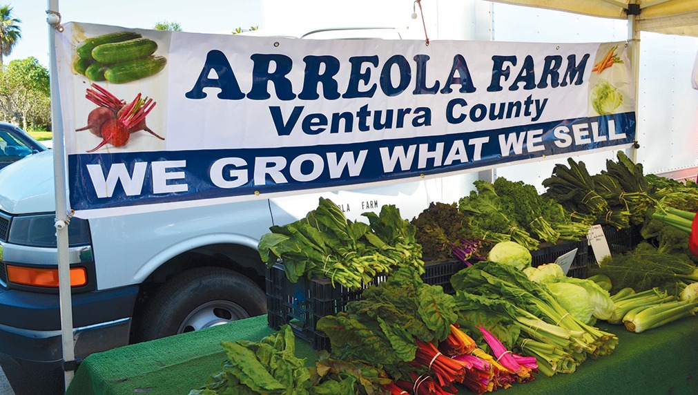 This banner at the Thousand Oaks Thursday afternoon farmers’ market shows language resulting from Assembly Bill 1871.